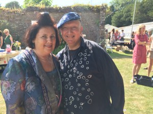 Suzy and milliner Stephen Jones enjoy the festival.