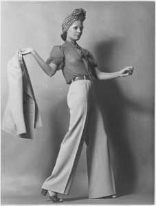 Gabardine pantsuit with polka-dot printed chiffon blouse. CREDIT © Fondation Pierre Bergé – Yves Saint Laurent